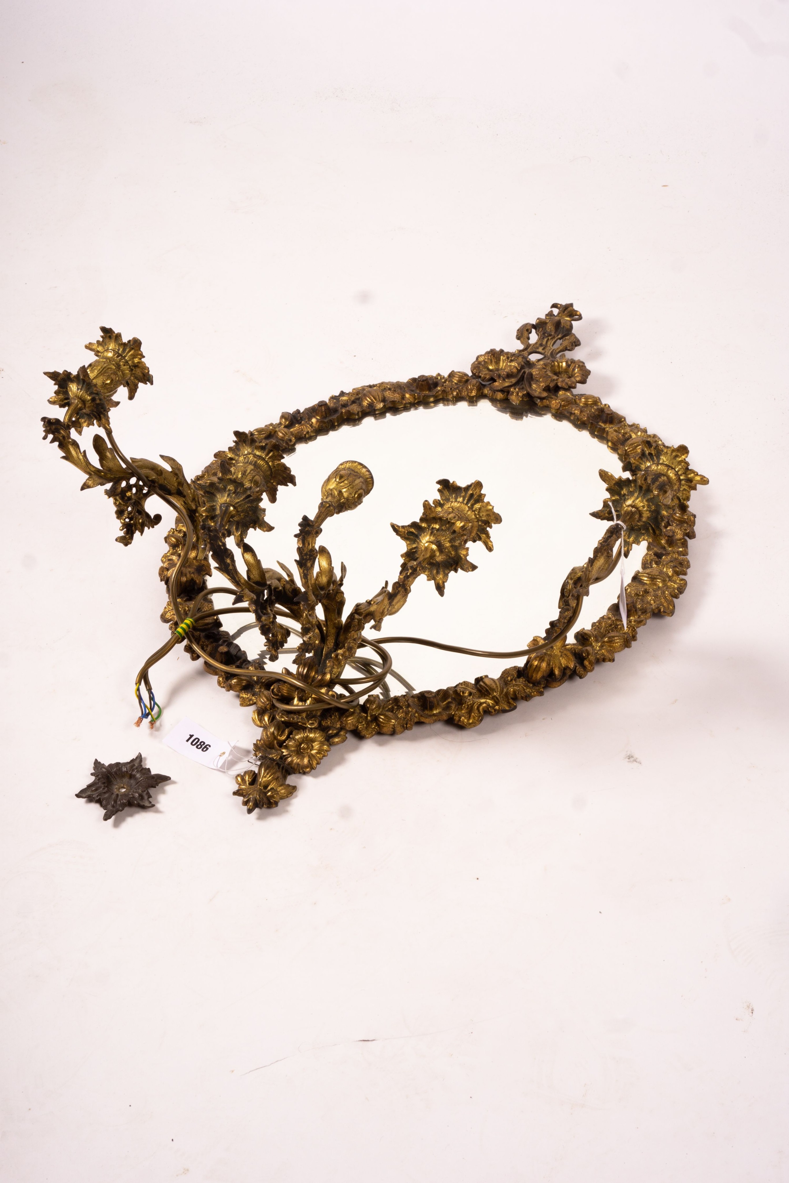 A late 19th century brass five branch girondole, width 64cm, height 84cm